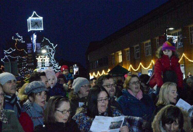 Carol singing at the Woodley Christmas light switch-on in 2018