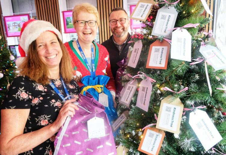 Kindness Tree at David Cliff Estate Agents. Lorriane Irwin, volunteer coordinator for The Link, with Liz McDaniel from The Link Visiting Scheme, and David Cliff.