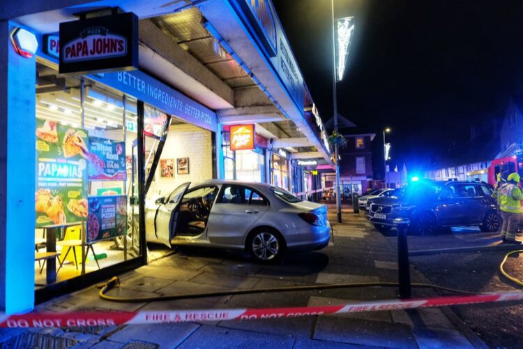 A car went through the doorway of Papa Johns in Wokingham's Peach Street Picture: Andrew Batt