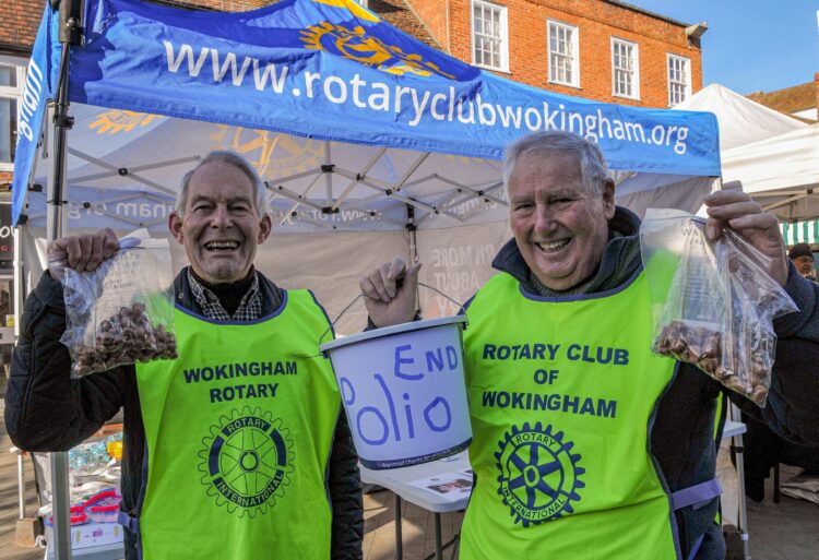 Wokingham Rotary Club members, Nick Campbell-White (President) and Gregor Johnston selling Crocus Bulbs in the Market Place on Saturday Picture: Steve Smyth