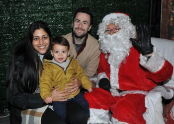 Visiting Santa at Hare Hatch Sheeplands on Saturday were Kira & Connor O'Callaghan with Bodhi (18 months) Picture: Steve Smyth