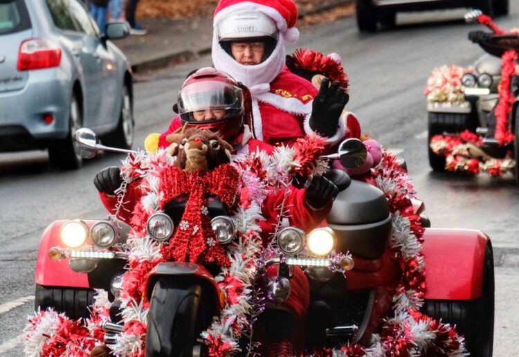 Wokingham Councillors Phil Cunnington and  delivering Children's gifts to High Close School, Wokingam on Sunday. Picture: Andrew Batt