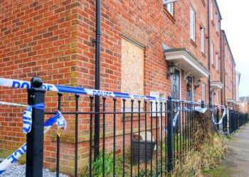 Police have sealed off a home in Wokingham's William Heelas Way after as suspected arson attack. They are appealing for anyone with information to come forward Picture: Andrew Batt