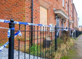 Police have sealed off a home in Wokingham's William Heelas Way after as suspected arson attack. They are appealing for anyone with information to come forward Picture: Andrew Batt