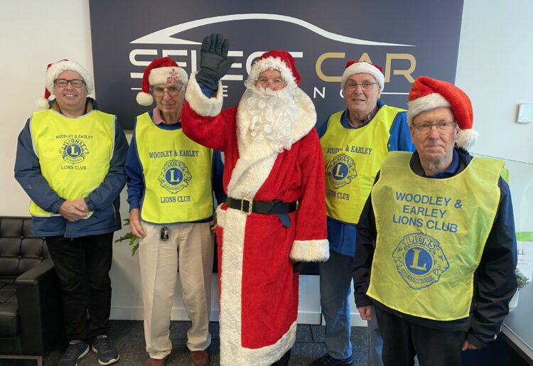 L-R - John Bennison, Paul Norman, Santa, Mike Tarling and Ian Elston at Select Car Leasing's Reading HQ