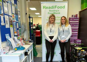 Alix Laflin (left), marketing manager for Vistry Thames Valley and Lycee Marsh (right), marketing assistant, delivering the food parcels to ReadiFood food bank