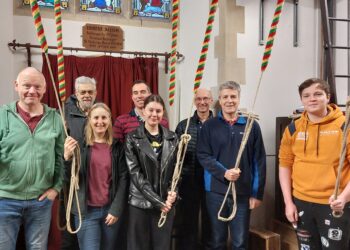 Ringers for the full peal at St Nicholas Church, Hurst, front row: Simon Farrar, Nicola Lee, Becki (14), conductor Nigal Mellor and James (16); behind them are John Harrison, David Maynard and Graham Slade