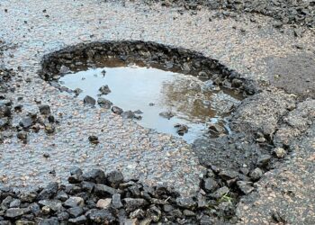 A pothole that appeared in Colemansmoor Lane in Woodley overnight on Friday, January 5 Picture: Phil Creighton