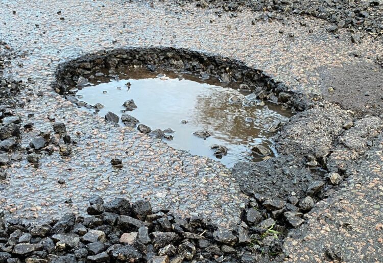 A pothole that appeared in Colemansmoor Lane in Woodley overnight on Friday, January 5 Picture: Phil Creighton