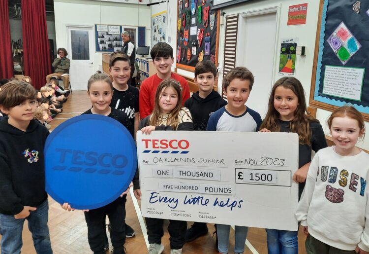 Students from Oaklands School celebrate their Tesco donation