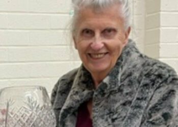 Joyce Robinson with the trophy presented to the winner of the Thames Valley Writers' Circle short story contest, judged by members