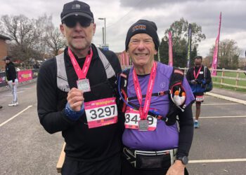 Trainer Stuart Ratcliff and Dr Steve Tanner, 70, ran the Wokingham half marathon, a first for Dr Tanner. Picture: Anne Reece