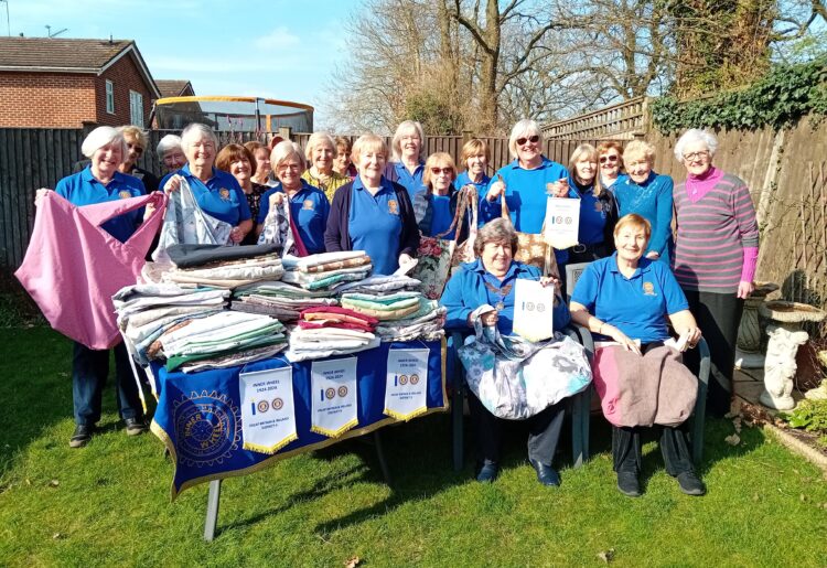 Members of the Inner Wheel Club of Reading maiden Erlegh displayed the 100 bags they had made at a lunch celebration. Picture IWCRME