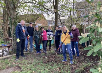 Teams of volunteers from FBC helped to restore Gorse Ride Schools' quiet garden at the weekend. Picture: Emma Merchant