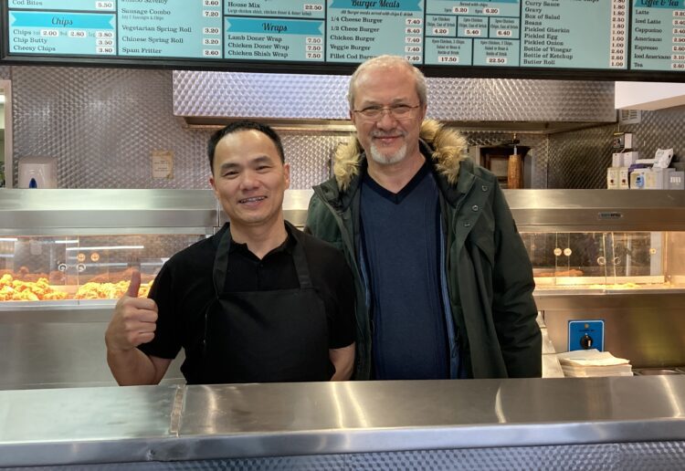 Staff at Station Fish Bar are pleased to be back in business. A car crash damaged the shop almost exactly two years ago. Picture: Emma Merchant