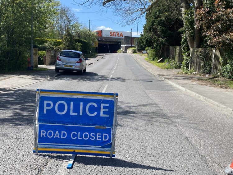 Thames Valley Police have closed Loddon Bridge Road in Woodley