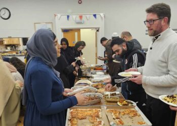 Father Richard Lamey (right) attended an Iftar dinner on Easter Sunday at St Paul's Parish Rooms Pictures: St Paul's Church