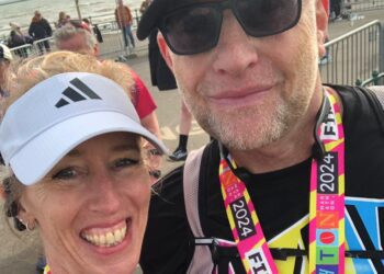 Anne Reece and Stuart Ratcliff crossed the finishing line at Brighton's Marathon in an identical time of five hours, 47minutes and 32 seconds. They ran to raise funds for Arts4Wokingham. Picture:Anne Reece and Stuart Ratcliff