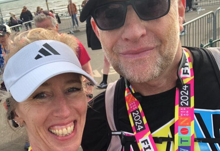 Anne Reece and Stuart Ratcliff crossed the finishing line at Brighton's Marathon in an identical time of five hours, 47minutes and 32 seconds. They ran to raise funds for Arts4Wokingham. Picture:Anne Reece and Stuart Ratcliff