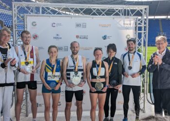 Reading Half Marathon awarded medals to those with the top three times in the Men's and Women's categories. From left: Cllr Tony Page, Tom Higgs, Rhian Hughes, Ben Cole, Kate Estela-Morris, Cassie Thorpe, Tom Higgs, and Sir John Madejski. Picture: Jake Clothier