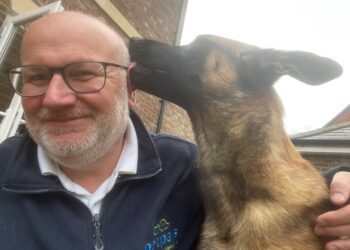Peter Lea with a furry friend. He now runs PetPals Wokingham and Sandhurst, which is just celebrating its 20th anniversary