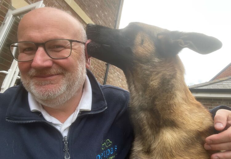 Peter Lea with a furry friend. He now runs PetPals Wokingham and Sandhurst, which is just celebrating its 20th anniversary