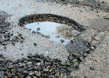 A pothole that appeared in Colemansmoor Lane in Woodley overnight on Friday, January 5 Picture: Phil Creighton