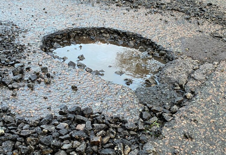 A pothole that appeared in Colemansmoor Lane in Woodley overnight on Friday, January 5 Picture: Phil Creighton