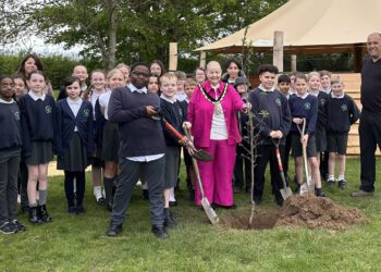 Children from Shinfield St Mary's Junior School, with Wokingham borough mayor Beth Rowlands at the planting of the school's 5000th tree. Picture: Shinfield St Mary's Junior School