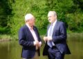Sir Ed Davey (right) with Clive Jones, on the banks of the River Loddon. Pic: Andrew Batt.