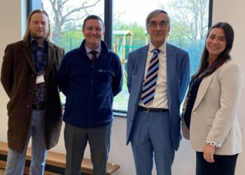 Sir John on a visit to the school.