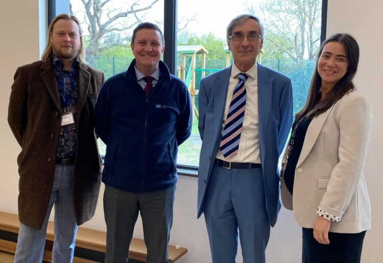 Sir John on a visit to the school.