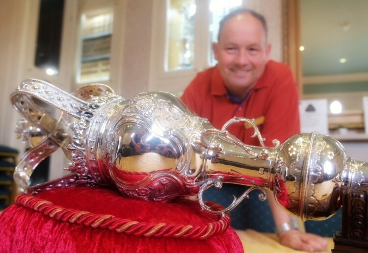 Mayor's attendant David Dunham with the mace that dates back to 1758.