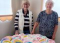Ann Way and Gerry Luckhurst have succeeded in knitting 100 hats for newborns. Picture: Inner Wheel Club of Reading Maiden Erlegh