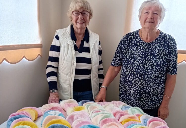 Ann Way and Gerry Luckhurst have succeeded in knitting 100 hats for newborns. Picture: Inner Wheel Club of Reading Maiden Erlegh