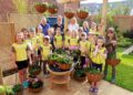Arborfield brownies and California Gardeners? Club created colourful hanging baskets.
