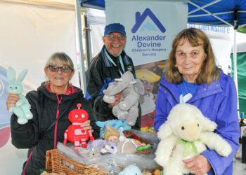 Volunteers for Alexander Devine Children's Hospice raising funds for the charity at the Earley Green Fair last year Picture: Steve Smyth