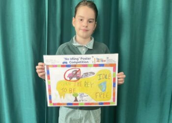 Amy with the winning poster. Pic: WBC.