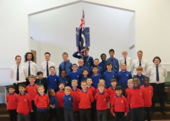 members of 1st Woodley Boys? Brigade and their families gathered to mark their special birthday, with refreshments, music, and a specially made commemorative sponge cake. Picture: 1st Woodley Boys' Brigade