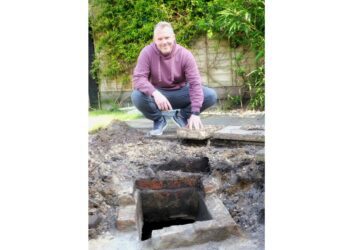 Andrew Cracknell and the mystery structure. Pic: Andrew Batt.