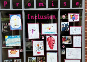 Members of Wokingham based charity Promise Inclusion have been creating pictures and taking photos of activities they enjoy, to decorate a unit in the town in celebration of Learning Disability Awareness Week. Picture: Promise Inclusion