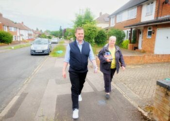 Former government minister Robert Jenrick with Pauline Jorgensen in Earley. Pic: Andrew Batt.