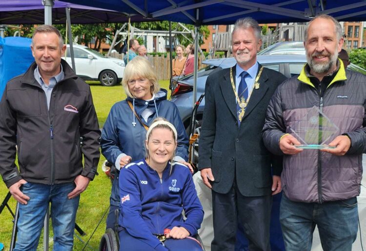 Wokingham Lions President Lyn Baily with Wokingham town mayor, councillor Rob Comber, and Kylie Grimes MBE,  at one of the trophy presentations. Pic: Wokingham Lions.