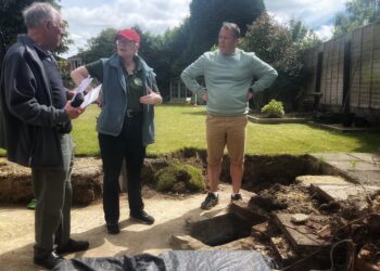 Peter Must (left) and Gillian Holmes with homeowner Andrew Cracknell. Pic: Andrew Batt.