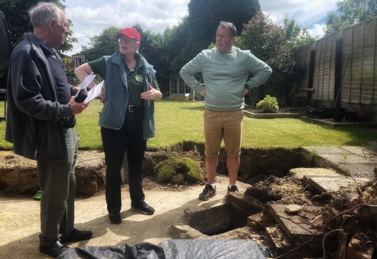 Peter Must (left) and Gillian Holmes with homeowner Andrew Cracknell. Pic: Andrew Batt.