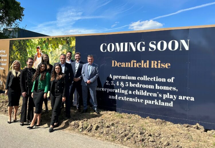 The Romans New Homes team outside the Deanfield Rise development in Binfield