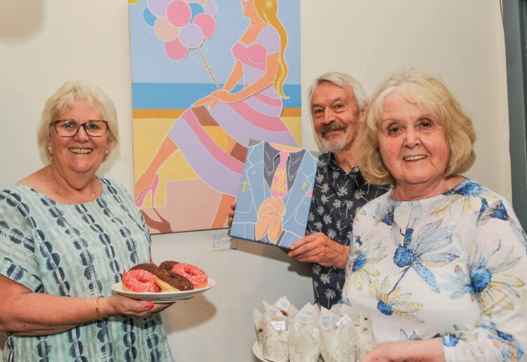 A Charity Cafe and Art Sale was held at the Shinfield Community Church on Saturday. Angela Baker with artist, Mike Hibbit and his wife, Maggie. Picture: Steve Smyth