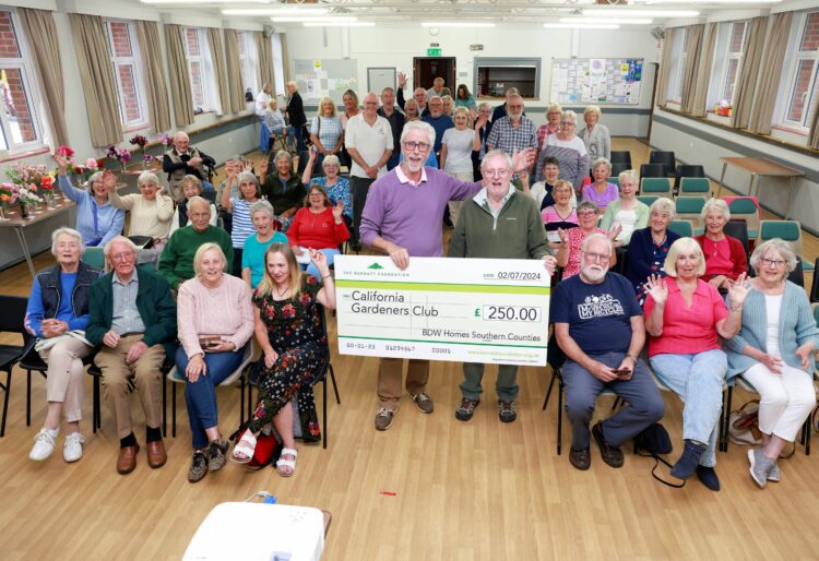 The cheque presentation from David Wilson Homes.