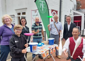 Twyford Parish councillors Sue Wisdom, Liz Ashley and Charles Wickenden, Twyford Parish Council chairman and borough councillor Martin Alder and borough councillor Stephen Conway with young plate spinner Jacob and Mark the juggler are pictured last Saturday outside Waitrose Twyford.