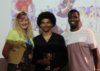 Cam (centre) has signed for Machester United.